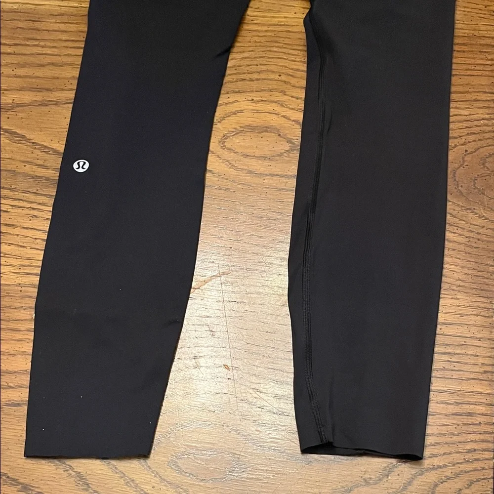 Lululemon Black High-Waisted 7/8 Leggings with‎ Reflective Detail, size 4